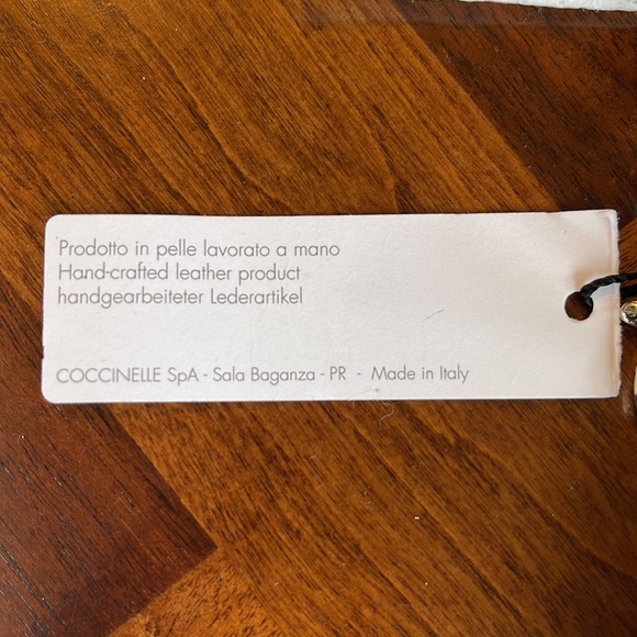 VINTAGE NEVER WORN (WITH TAGS) COCCINELLE BLACK LEATHER WRISTLET - Picture 4 of 8